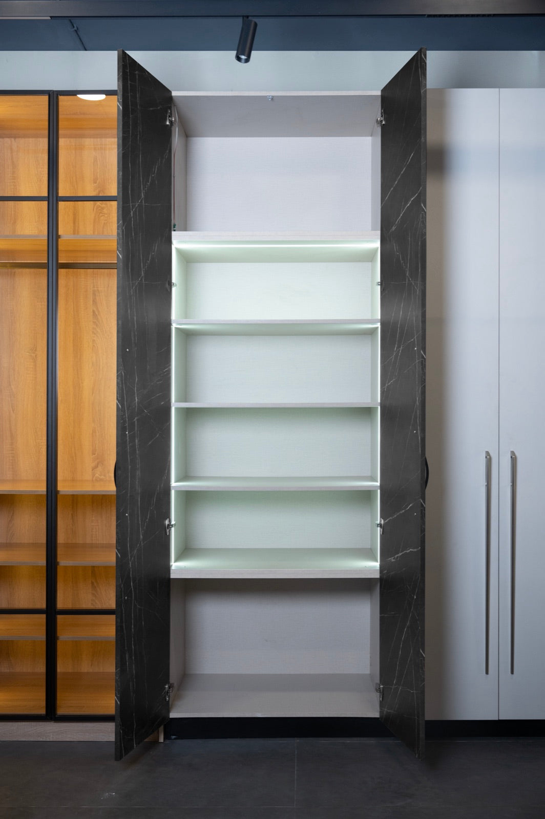 Marble door · lit glass shelving