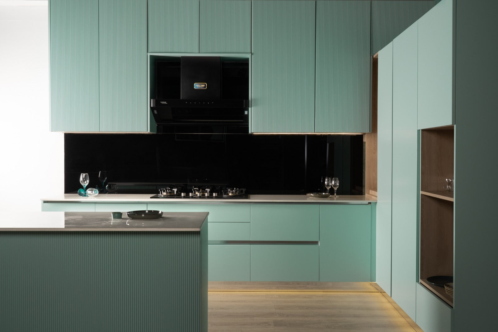 Teal fluted tall units