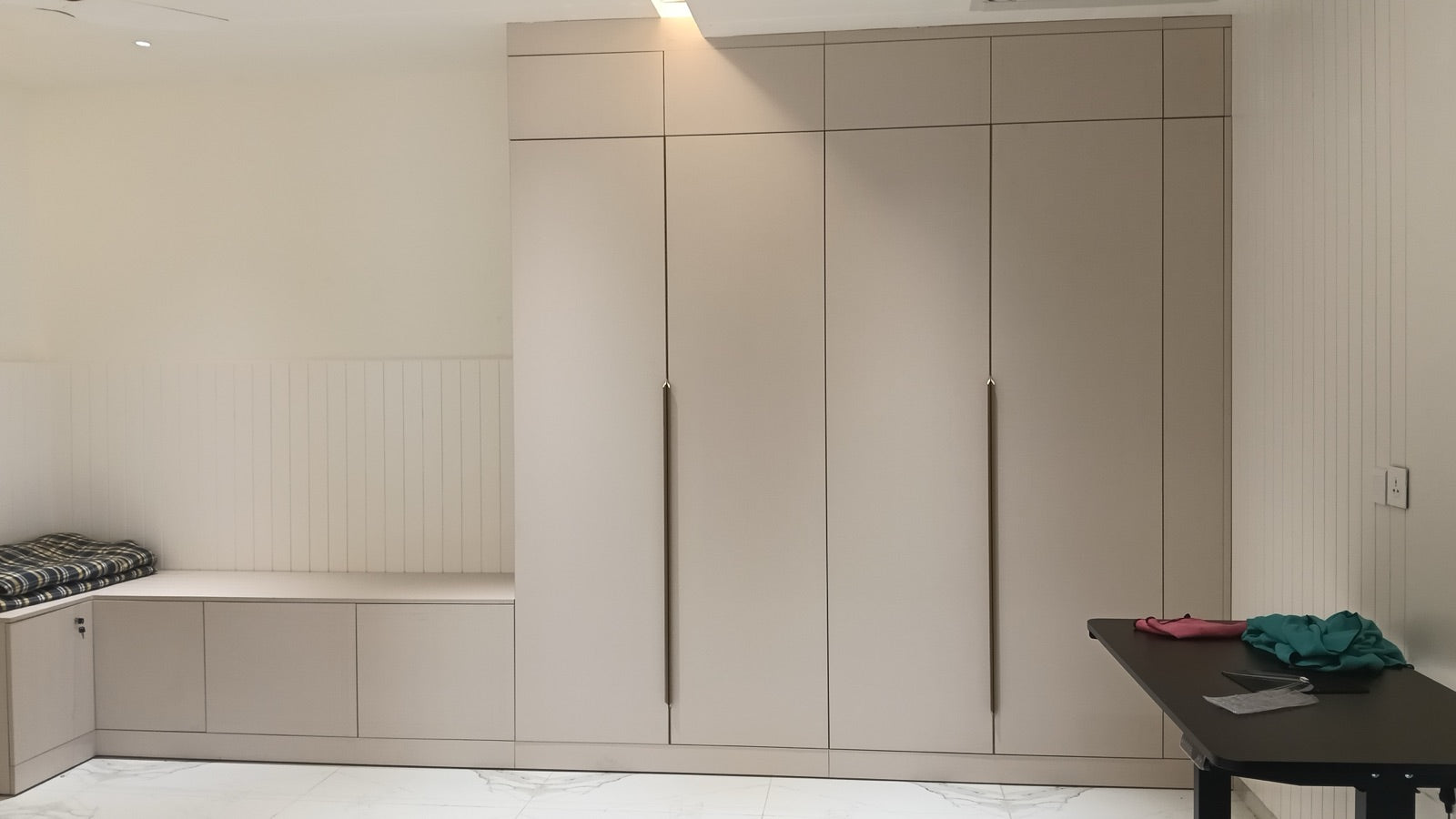 Corner wardrobe with built-in storage bench
